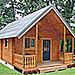 Flying Pig - Vacation Cabin Rentals - Enjoy your upcoming Yellowstone vacation by staying in a warm Montana cabin. Select from 1-room units sleeping 4-6, up to family lodges sleeping 14+. Dining packages too.
